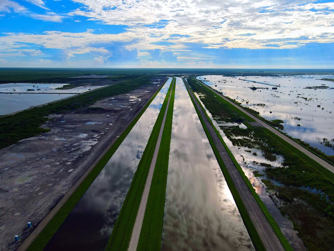 An aerial photo of the Everglades Agricultural Area (EAA) Contract 10. It is the 8-mile inflow/outflow canal (3,000 CFS) and 7-mile seepage canal / maintenance road (Northern Boundary of Reservoir).
The EAA is part of the Central Everglades Planning Project (CEPP) and the Comprehensive Everglades Restoration Plan (CERP). The project will set the foundation for restoring the central portion of the Everglades ecosystem and sending additional water south. CEPP EAA will capture water lost to tide and re-direct water flow south to the central Everglades, Everglades National Park, and Florida Bay. (U.S. Army Photo by Mark Rankin)