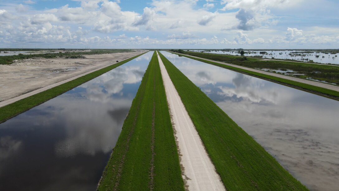 An aerial photo of the Everglades Agricultural Area (EAA) Contract 10. It is the 8-mile inflow/outflow canal (3,000 CFS) and 7-mile seepage canal / maintenance road (Northern Boundary of Reservoir).
The EAA is part of the Central Everglades Planning Project (CEPP) and the Comprehensive Everglades Restoration Plan (CERP). The project will set the foundation for restoring the central portion of the Everglades ecosystem and sending additional water south. CEPP EAA will capture water lost to tide and re-direct water flow south to the central Everglades, Everglades National Park, and Florida Bay. (U.S. Army Photo by Mark Rankin)