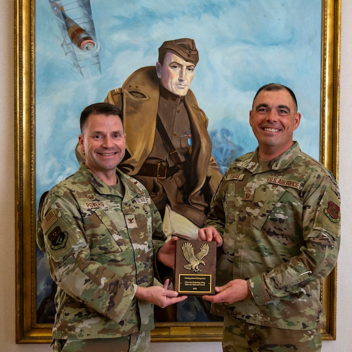 Air Force leaders pose with the National Guard Association of the United States Distinguished Flying Unit Plaque at Rickenbacker Air National Guard Base, Columbus, Ohio, September 7, 2025.