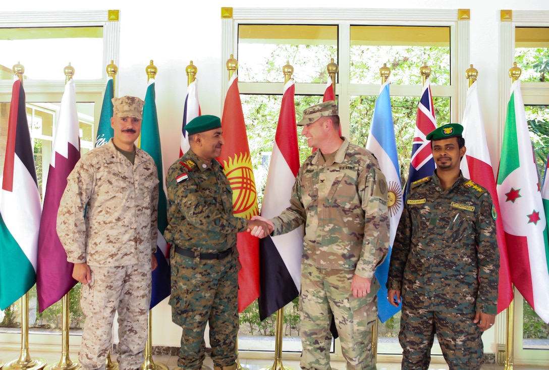 U.S. Marine Lt. Col. Daniel Quesada, CENTCOM J57 lead planner for Bright Star 25, left; Yemeni Maj. Gen. Ismail Zahzouh, commander of Special Operations Forces, center; and U.S. Army Col. Lee Breard, U.S. Central Command J57 Exercises Division chief, pose for a photo at Mohamed Naguib Military Base, Sept. 7, 2025. Bright Star 2025 is a multilateral U.S. Central Command exercise co-hosted with Egypt across air, land and sea domains. The exercise promotes regional security and cooperation and improves interoperability in irregular warfare against hybrid threats, with more than 40 countries participating this year. (U.S. Central Command photo by Maged Benjamin-Elias)