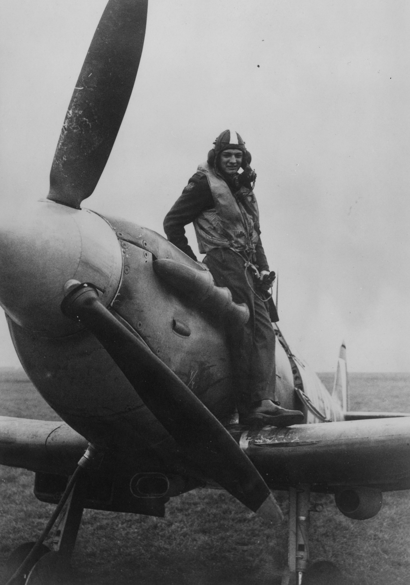Flight Lieutenant William J. “Diamond Jim” Daley  (1919-1944)  of No. 121 (Eagle) Squadron, RAF with his Spitfire Mk. V.   Handwritten caption on reverse: '121 E.S. Fox Studio Photo U.K. Jim Daley, Pilot.'  In 1942 he briefly commanded the 335th Fighter Squadron in the 4th Fighter Group in England, and in 1943 became the Deputy Commander of the 371st Fighter Group, USAAF(American Air Museum in Britain)
