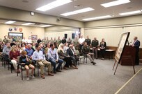 A ceremony marks the return of a historic flag from more than 100 years ago to Pennsylvania National Guard headquarters September 29, 2025, at Fort Indiantown Gap, Pennsylvania. Joseph Reselli, an electrician and lifelong Pennsylvanian who purchased the flag and donated it, presented the flag to Maj. Gen. John R. Pippy, Pennsylvania’s adjutant general, and Command Sgt. Maj. Shawn Phillips, command senior enlisted advisor. It is believed to date from 1920-21, soon after the National Defense Act of 1920 reorganized the U.S. armed forces and formally designated the National Guard, which had previously been known as militias. (U.S. Army National Guard photo by Zane Craig)