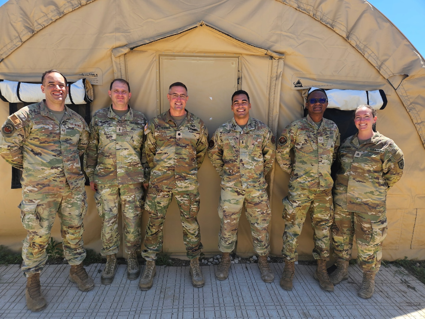 LEAP Scholars and U.S. Army personnel assemble for a photo during the Warrior Engaged exercise at Camp Bullis, Texas. From left to right: USAF Tech. Sgt. Carlos Marrero-Estrada (Spanish LEAP Scholar); U.S. Army Chief Warrant Officer 4 Dale W. Hunter II (HUMINT Readiness); U.S. Army Lt. Col. Christopher L. Bettinger (Battalion Commander); U.S. Air Force 1st Lt. Paulo F. Martinez, (Spanish LEAP Scholar); U.S. Air Force Staff Sgt. Georges A. Yaguibou (French LEAP Scholar); and U.S. Army Staff Sgt. Dorothy A. Sullivan (Intelligence Analyst). (Contributed photo)