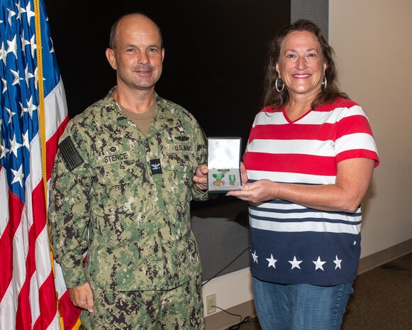 Capt. Paul Stence, Jr., Naval Surface Warfare Center Panama City Division (NSWC PCD) commanding officer, recognized outstanding NSWC PCD member, Nicole Stevens, for her exceptional contributions to the command's contracting department with the Civilian Service Achievement Medal.