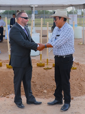 Rick Arvey, project manager with the U.S. Army Corps of Engineers Los Angeles District’s Section 595 Program, left, shakes hands with Pascua Yaqui Tribe Vice Chairman Peter Yucupicio before the Tribe’s Section 595 Project groundbreaking Sept. 16 near Tucson, Arizona.