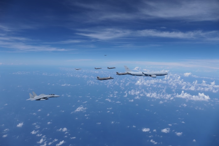 A Royal Australian Air Force (RAAF) KC-30, two U.S. Air Force F-35s, two RAAF F-35s and two Japan Air Self-Defense Force (JASDF) F-15Js fly in formation over the Pacific Ocean prior to the start of Exercise Bushido Guardian (BG) 25 near Misawa Air Base, Japan,  Sept. 26, 2025.
