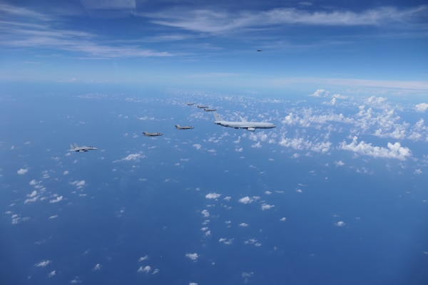 A Royal Australian Air Force (RAAF) KC-30, two U.S. Air Force F-35s, two RAAF F-35s and two Japan Air Self-Defense Force (JASDF) F-15Js fly in formation over the Pacific Ocean prior to the start of Exercise Bushido Guardian (BG) 25 near Misawa Air Base, Japan,  Sept. 26, 2025.