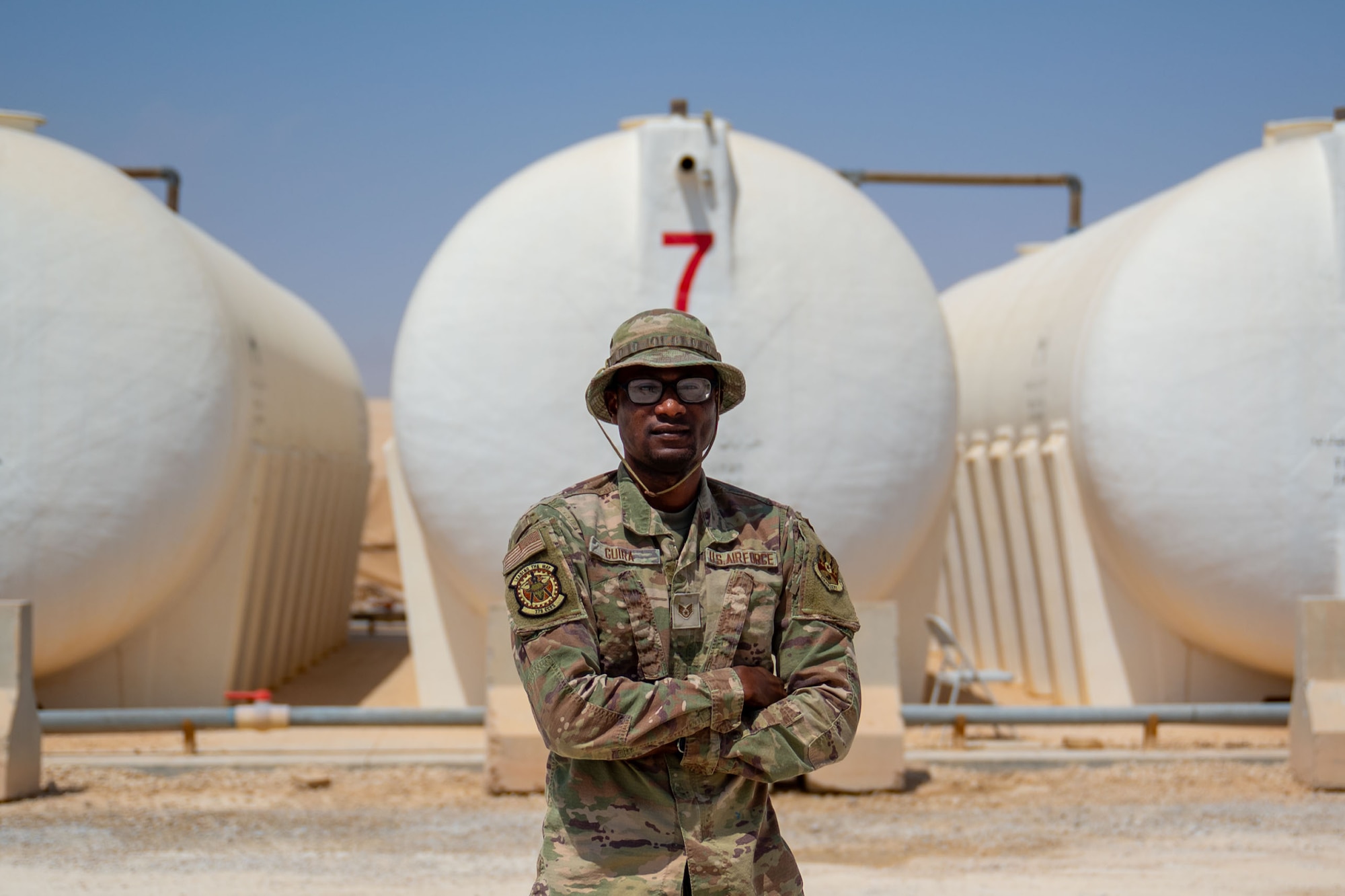 U.S. Air Force Staff Sgt. Abdul Guira, 378th Expeditionary Civil Engineer Squadron water and fuel systems maintenance craftsman, poses for a photo.