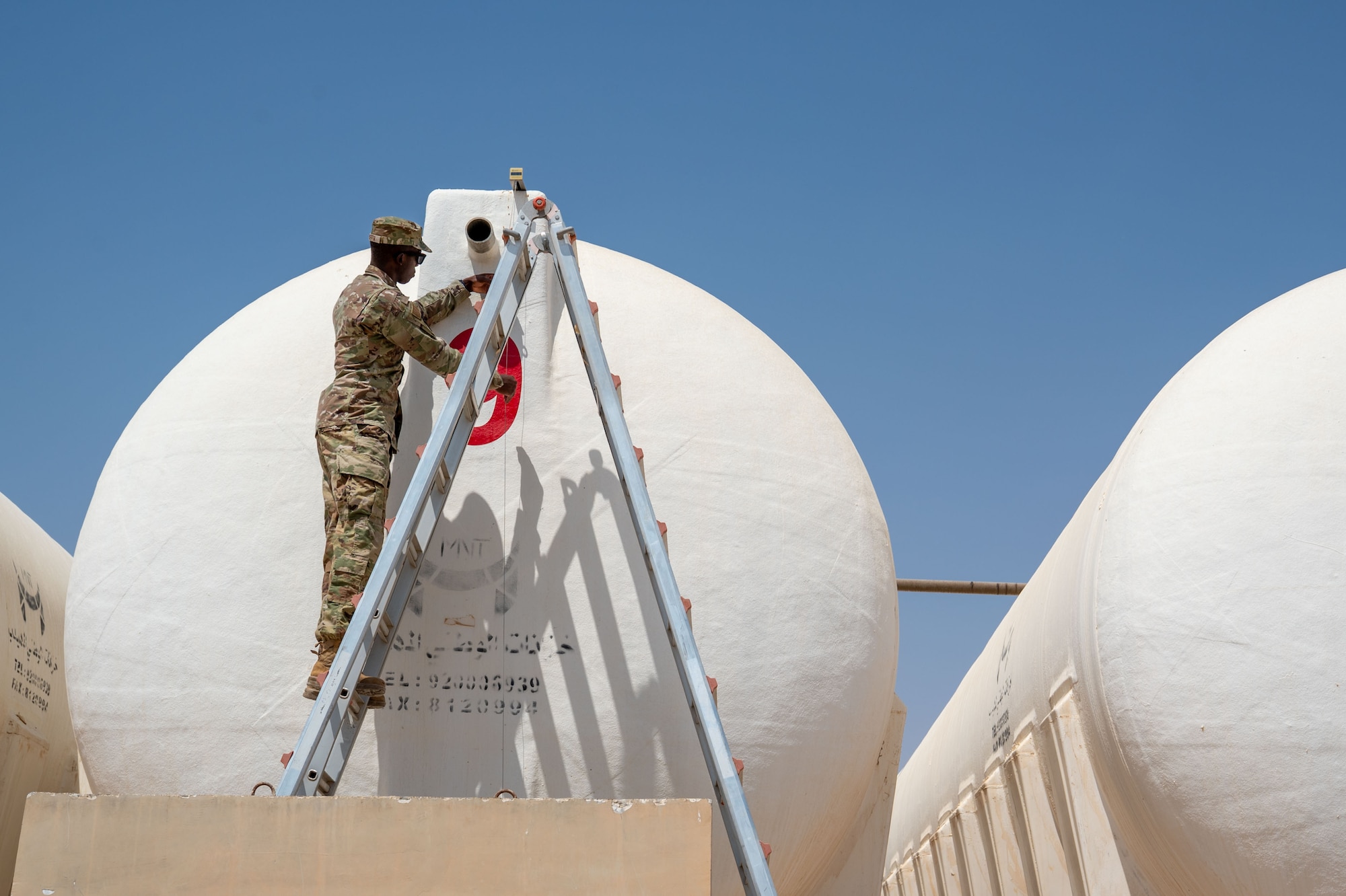 U.S. Air Force Senior Airman Daniel Kapsetta, 378th Expeditionary Civil Engineer Squadron water and fuel systems maintenance journeyman, inspects a water-level float.