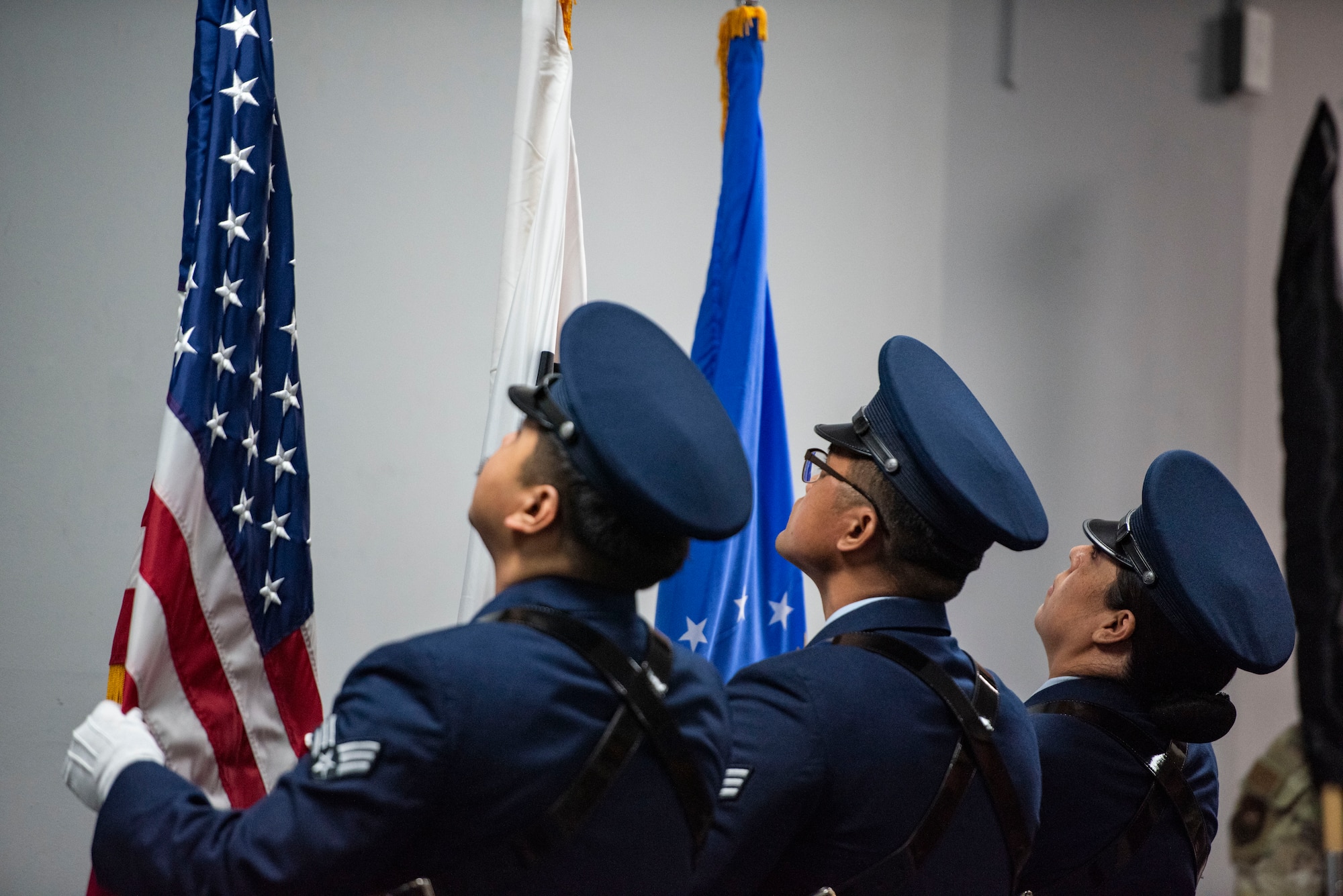 U.S. Air Force service members assigned to the 51st Fighter Wing Honor Guard, present the colors during the 51st Mission Support Group Detachment 1 activation ceremony at Suwon Air Base