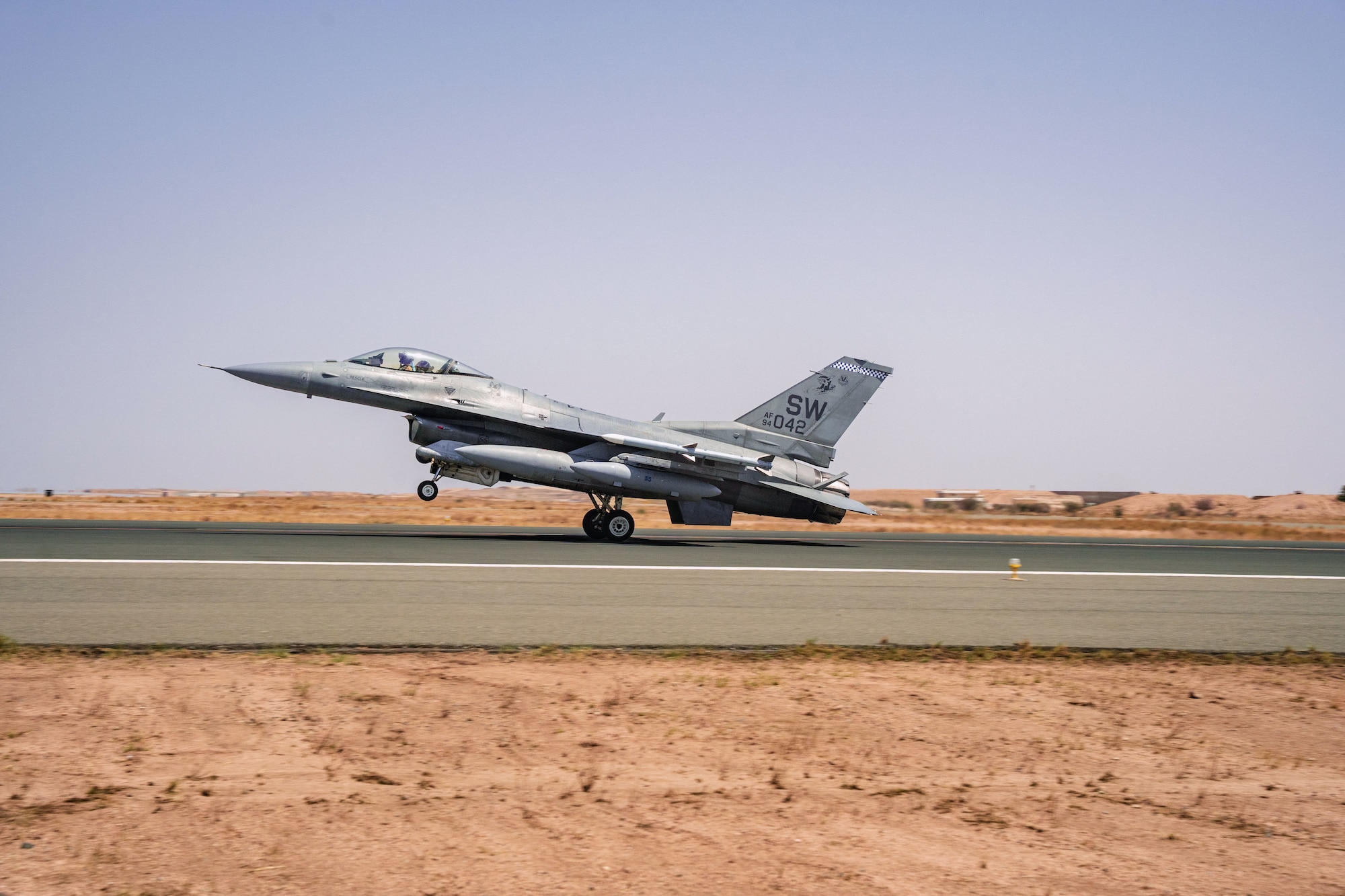 A U.S. Air Force F-16 Fighting Falcon assigned to the 55th Expeditionary Fighter Squadron lands for Operation Agile Spartan.