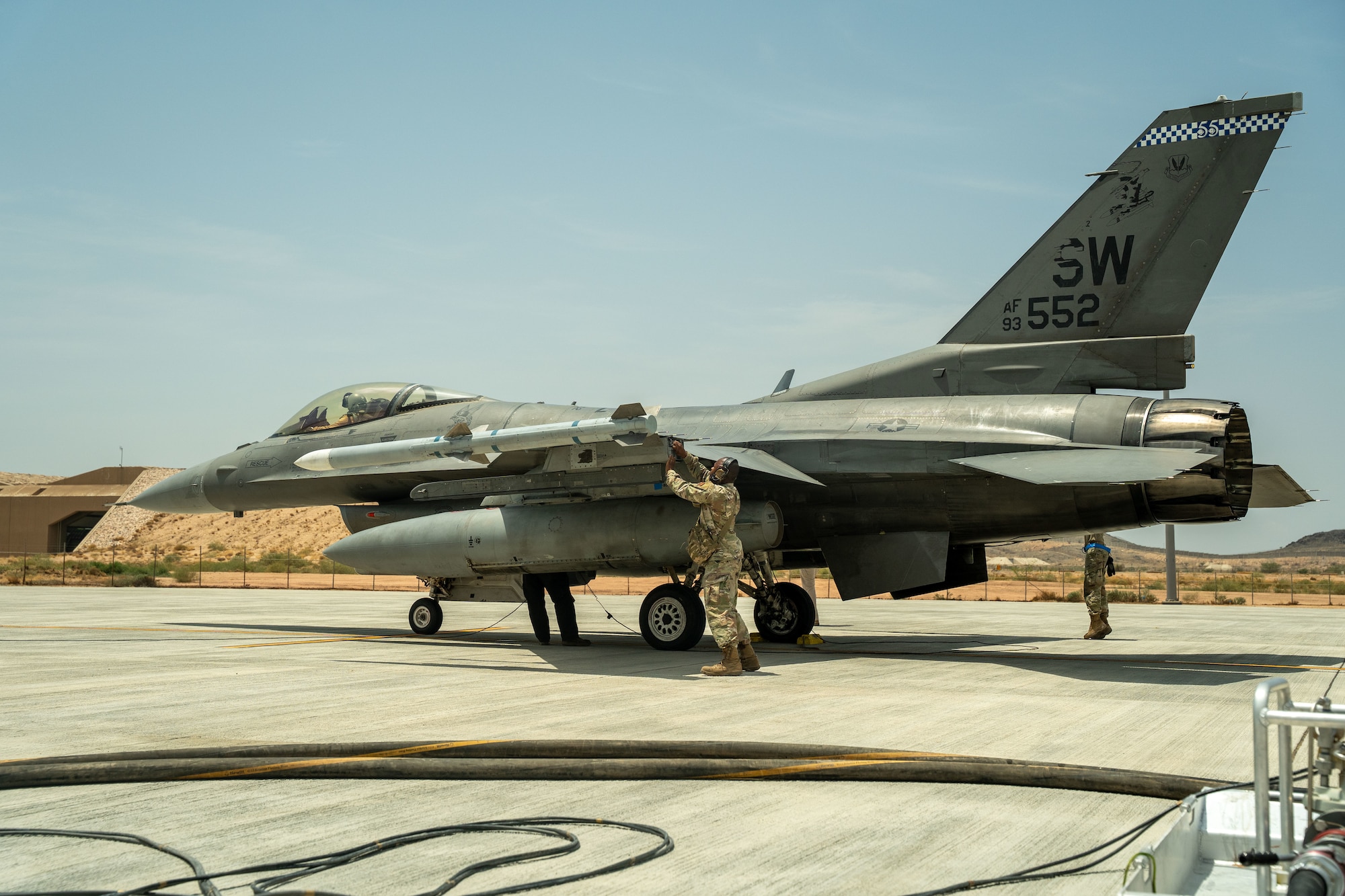 U.S. Air Force Staff Sgt. Donyea Lackey 55th Expeditionary Fighter Generation Squadron weapons load crew chief, conducts final inspections after a simulated integrated combat turn.