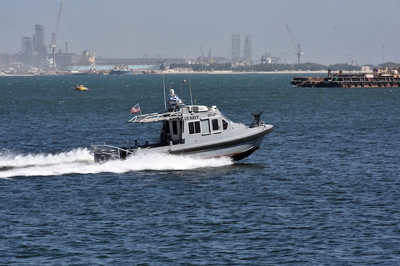 A 33-foot Force Protection-Medium (FP-M) Harbor Security Boat (HSB), attached to Naval Support Activity (NSA) Bahrain, responds to a small boat probe attack during a force protection drill, Sept. 29, 2025. Force Protection drills are critical to reinforce and refine pre-planned responses and standard operating procedures in response to various potential threats. NSA Bahrain enables the forward operations and responsiveness of U.S. and allied forces in support of the Navy Region Europe, Africa, Central mission to provide services to the fleet, warfighter and family. (U.S. Navy photo by Lt. Bryan Blair)