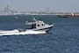 A 33-foot Force Protection-Medium (FP-M) Harbor Security Boat (HSB), attached to Naval Support Activity (NSA) Bahrain, responds to a small boat probe attack during a force protection drill, Sept. 29, 2025. Force Protection drills are critical to reinforce and refine pre-planned responses and standard operating procedures in response to various potential threats. NSA Bahrain enables the forward operations and responsiveness of U.S. and allied forces in support of the Navy Region Europe, Africa, Central mission to provide services to the fleet, warfighter and family. (U.S. Navy photo by Lt. Bryan Blair)