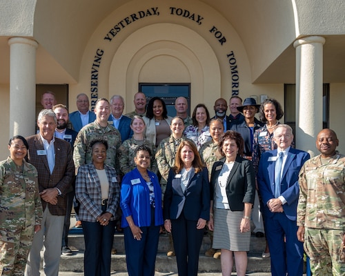42nd Air Base Wing leadership and their honorary commanders pose for a group photo at the Enlisted Heritage Hall as they kick off a tour of Air Force heritage and the local mission at Gunter Annex, Sept. 29, 2025. The Honorary Commander Program pairs military commanders with community leaders to promote transparency, mutual support, and collaborative problem-solving; the immersive tour was designed to deepen the community’s understanding of the 42nd ABW mission. (U.S. Air Force photo by Melanie Rodgers Cox)