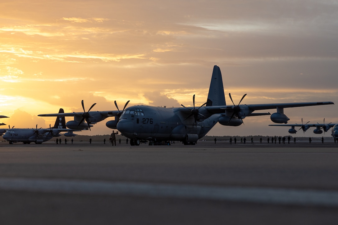 U.S. Marines with Marine Aerial Refueler Transport Squadron (VMGR) 252, Marine Aircraft Group 14, 2nd Marine Aircraft Wing, stage a KC-130J Super Hercules on the flightline at Marine Corps Air Station (MCAS) Cherry Point, North Carolina, Sept. 23, 2025. Marines with VMGR-252 deployed from MCAS Cherry Point to support Marine Medium Tiltrotor Squadron (VMM) 162 (Reinforced) as part of Combined Joint Task Force-Horn of Africa, which conducts operations to enhance partner nation capacity, promote regional stability, dissuade conflict, and protect U.S. and partner interests. (U.S. Marine Corps photo by Lance Cpl. Gavin K. Kulczewski)
