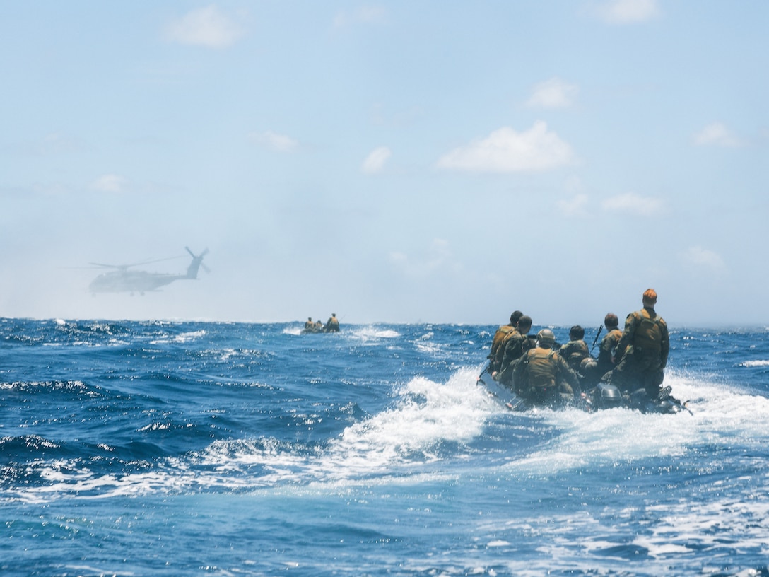 CARIBBEAN SEA – U.S. Marines with Maritime Special Purpose Force, 22nd Marine Expeditionary Unit (Special Operations Capable), ride in enhanced combat rubber raiding craft during helocast operations training while underway in the Caribbean Sea, Sept. 4, 2025. U.S. military forces are deployed to the Caribbean in support of the U.S. Southern Command mission, Department of War-directed operations, and the president’s priorities. (U.S. Marine Corps photo by Sgt. Tanner Bernat)