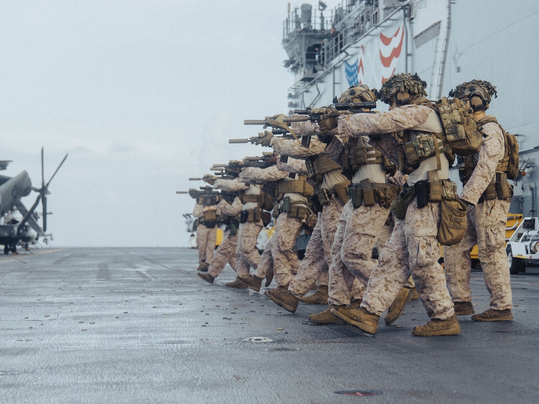 CARIBBEAN SEA - U.S. Marines with Battalion Landing Team 3/6, 22nd Marine Expeditionary Unit (Special Operations Capable), conduct live fire drills aboard the Wasp-class amphibious assault ship USS Iwo Jima (LHD 7), while underway in the Caribbean Sea, Sep. 17, 2025. U.S. military forces are deployed to the Caribbean in support of the U.S. Southern Command mission, Department of War-directed operations, and the president’s priorities. (U.S. Marine Corps photo by Sgt. Tanner Bernat)