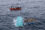 The crew of the U.S. Coast Guard Cutter Seneca (WMEC 906) recovers bales of cocaine after a suspected drug smuggling vessel capsized in the Pacific Ocean, Sept. 17, 2025. Seneca’s crew worked alongside interagency partners to interdict illicit narcotics in the international waters in the Eastern Pacific Ocean.  (U.S. Coast Guard photo)