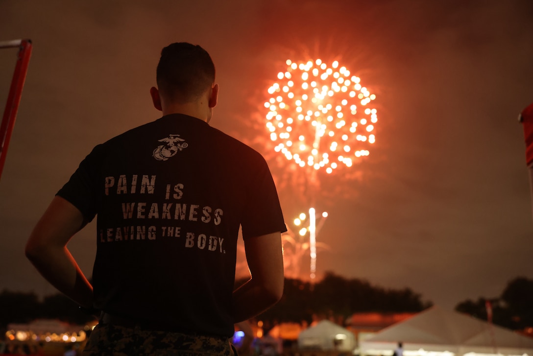 U.S. Marine Corps Sgt. Bryan Yepes, a canvassing recruiter with Recruiting Station Fort Worth, 8th Marine Corps District, watches the fireworks during the Fort Worth Fourth of July event in Fort Worth, Texas, July 4th, 2025