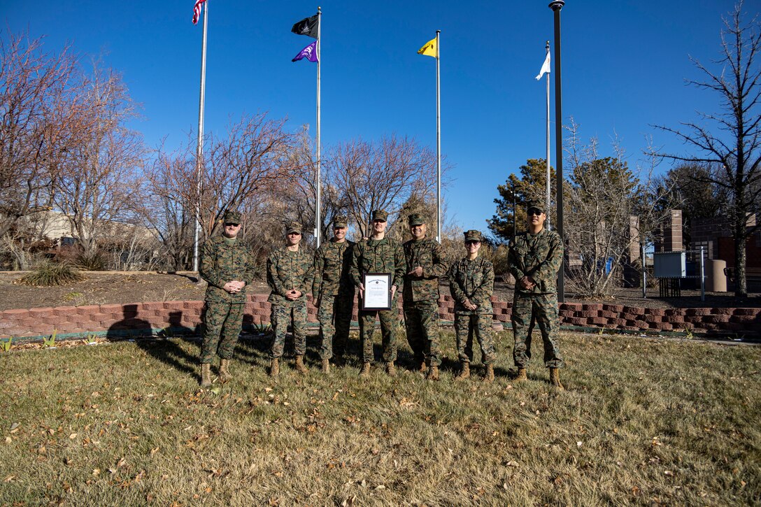 U.S. Marines with Recruiting Station Albuquerque, 8th Marine Corps District, pose for a group photo after a promotion ceremony at Veterans Memorial Park, Rio Rancho, NM, Dec 15, 2024. White’s service to the Marine Corps embodies the best version of himself through his selfless actions to make sure the Recruiters are successful. White is a native of Iowa. (U.S. Marine Corps photo by Sgt. Mark Anthony Morales)