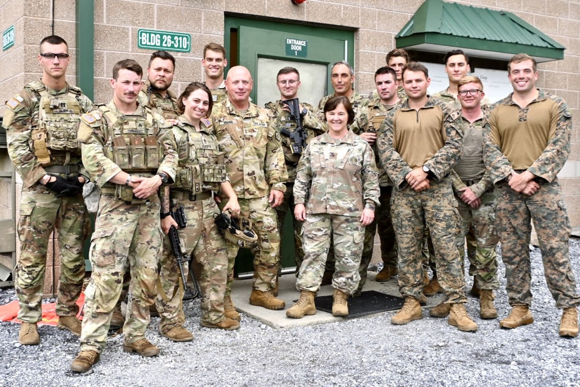 Brig. Gen. Laura McHugh and Command Sgt. Maj. Oscar Laughman participate in the annual Live Fire Shoot House Master Trainer Course at Fort Indiantown Gap, Pennsylvania, July 24, 2024. The Pennsylvania Individual Training Branch Marksmanship Training Unit led the course of eight students from Pennsylvania Army National Guard and U.S. Marine Corps units. (U.S. Army National Guard Photo by Spc Jessica Barb)