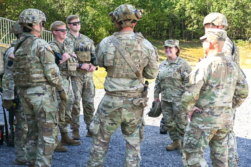 Maj. Gen. Laura McHugh, Deputy Adjutant General-Army, and Command Sgt. Maj. Oscar Laughman, command senior enlisted leader-Army, visit the Live Fire Shoot House Master Trainer course at Fort Indiantown Gap, Pennsylvania, Sept. 3, 2025. The nine-day course focuses on team move and shoot drills and properly executing room clearing procedures. (U.S. Army National Guard photo by Sgt. Kayden Bedwell)