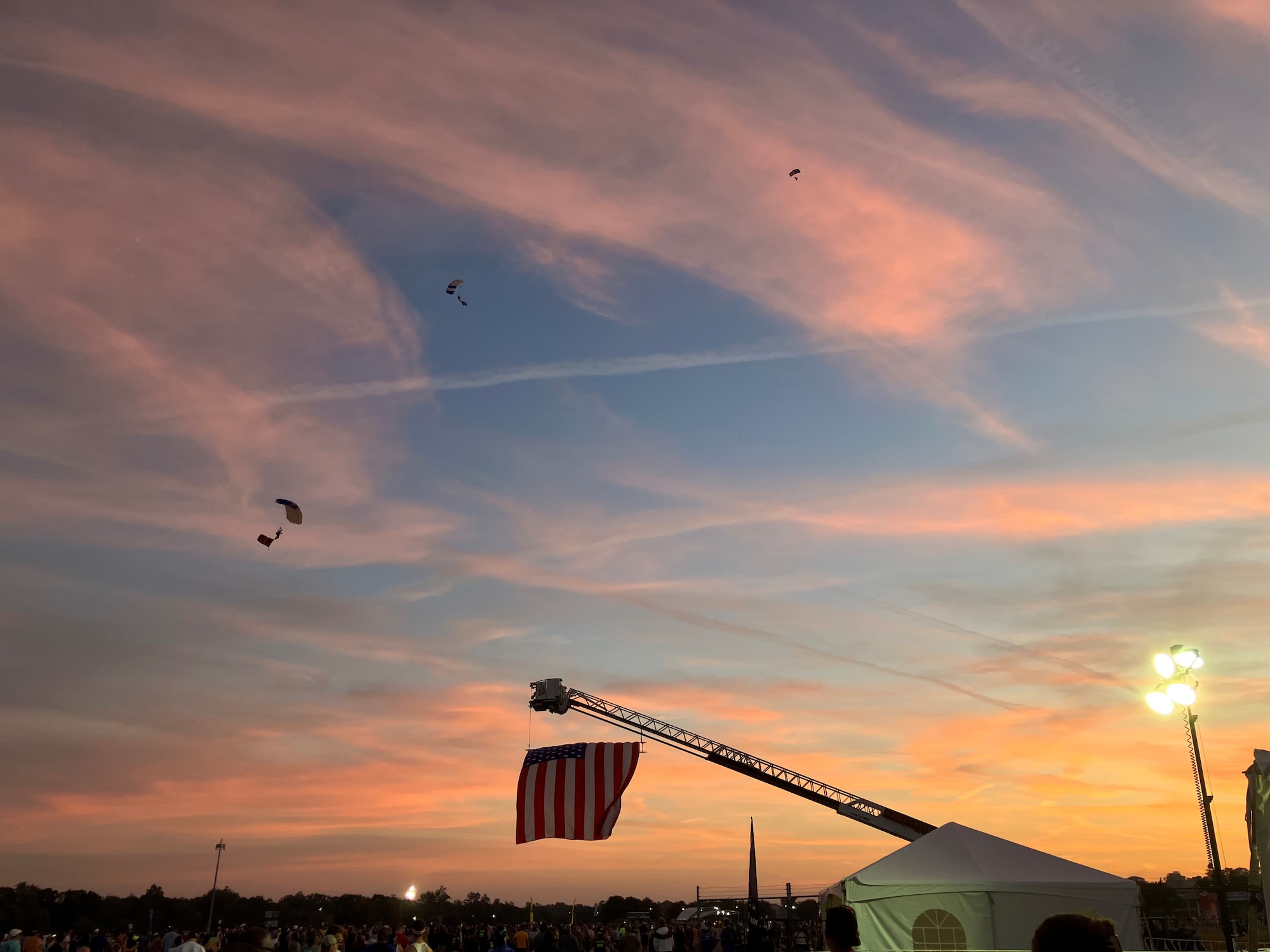 The U.S. Air Force Academy parachute team, the Wings of Blue, perform prior to the start of marathon events at Wright-Patterson Air Force Base, Ohio, Sept. 20, 2025.