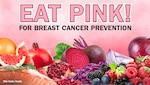 Image of pink and purple fruits, like grapefruit, berries, and cabbage.