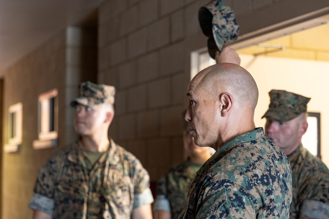 U.S. Marine Corps Sgt. Maj. Rodney E. Nevinger, command senior enlisted advisor of I Marine Expeditionary Force, talks to Marines with 7th Engineer Support Battalion, 1st Marine Logistics Group, about the barracks during Operation Clean Sweep III on Marine Corps Base Camp Pendleton, California, Sept. 23, 2025. OCS III is part of a joint initiative aimed at revitalizing the barracks infrastructure and enhancing operational readiness for Marines and Sailors residing within the barracks. (U.S. Marine Corps photo by Cpl. Savannah Norris)