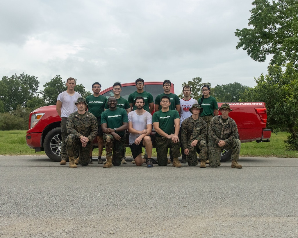 U.S. Marines and officer candidates with Officer Selection Team Austin, Recruiting Station Austin, pose for a picture after conducting a hike at The Meadows Center for Water and the Environment in San Marcos, Texas, July 19, 2025. The hike was conducted to prepare the candidates for Marine Corps Officer Candidates School. (U.S. Marine Corps photo by Sgt. Jose D. Cruz)