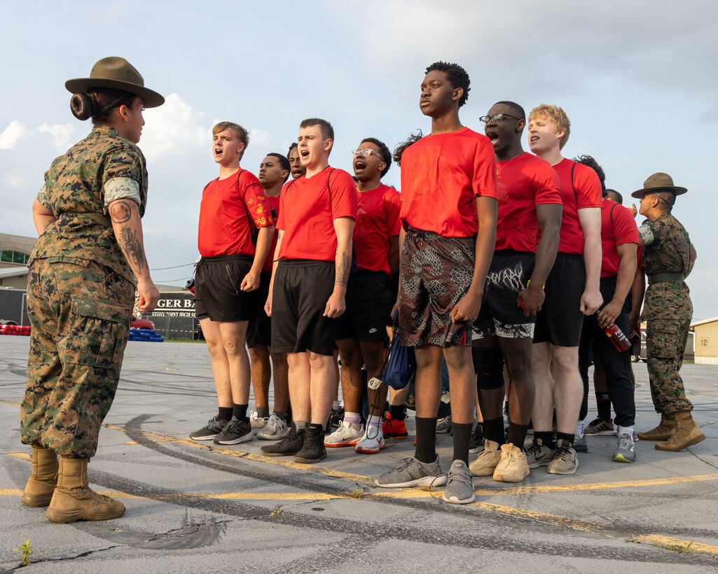 U.S. Marine Corps Staff Sgt. Rebecca P. Lamadrid, a drill instructor with India Company, 3rd Recruit Training Battalion, Marine Corps Recruit Depot San Diego, instructs poolees during RS Austin's first annual pool function at Stony Point High School, Round Rock, Texas, April 25, 2025. Annual pool functions serve as an opportunity for future Marines and family members to view and receive a firsthand experience of some of the rigors they will face in recruit training while providing an opportunity for team building and education as well as time for questions and answers. (U.S. Marine Corps photo by Cpl. Jose D. Cruz)