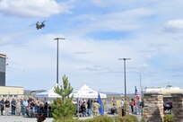 A CH-47 Chinook performs a memorial service flight at the Nevada Army Guard Aviation Support Facility in Stead during a ceremony Thursday to honor the 20th anniversary of when five aboard Mustang 22, including two Nevada Army Guardsmen, died in Afghanistan from a rocket-propelled grenade.