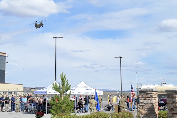 A CH-47 Chinook performs a memorial service flight at the Nevada Army Guard Aviation Support Facility in Stead during a ceremony Thursday to honor the 20th anniversary of when five aboard Mustang 22, including two Nevada Army Guardsmen, died in Afghanistan from a rocket-propelled grenade.
