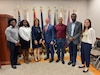 Five interns stand next to the Joint Program Executive Officer and Deputy Joint Program Executive Officer of the Joint Program Executive Office for Chemical, Biological, Radiological and Nuclear Defense.