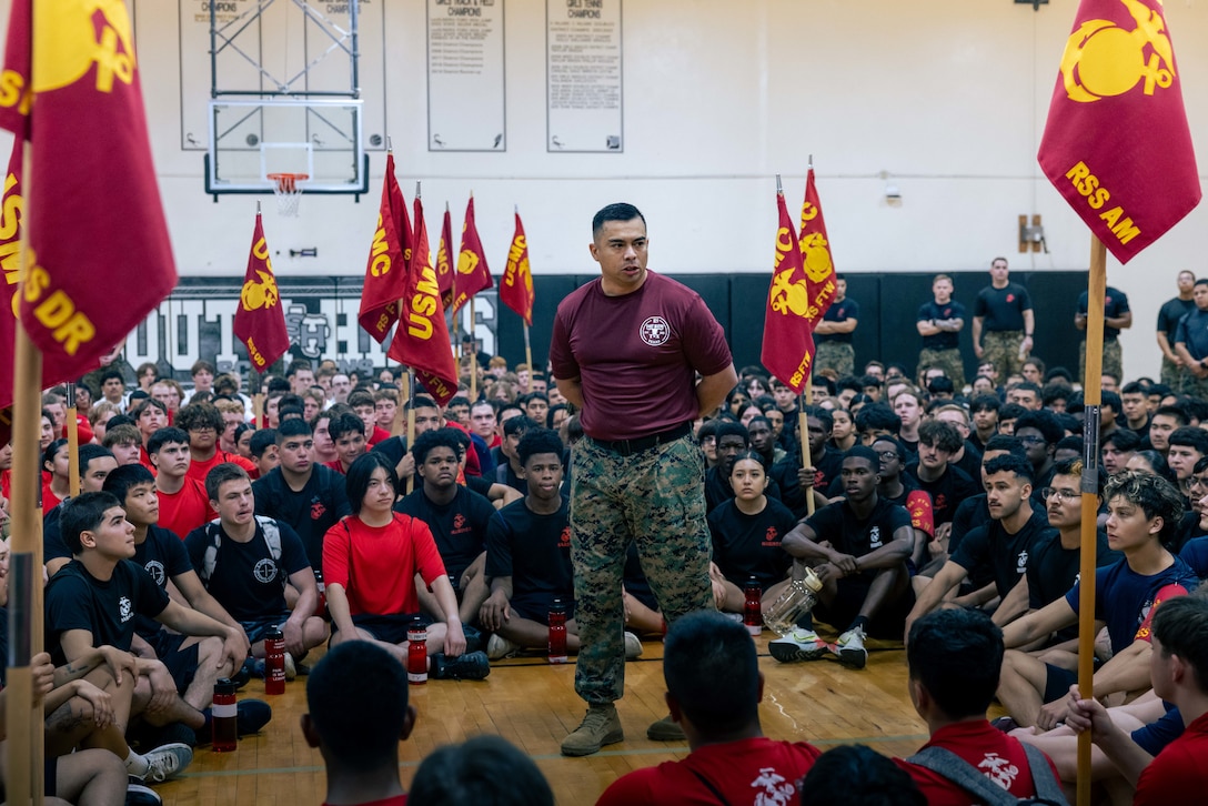 U.S. Marine Corps Maj. John Garcia, the commanding officer of Recruiting Station Fort Worth, addresses Poolees during the 2025 annual pool function at South Hills High School, Fort Worth, TX., April 26, 2025. The annual pool function served as an opportunity for future Marines to build camaraderie and experience firsthand some of the rigors they will face during recruit training. (U.S. Marine Corps photo by Sgt. Jaiden O. Sangster)