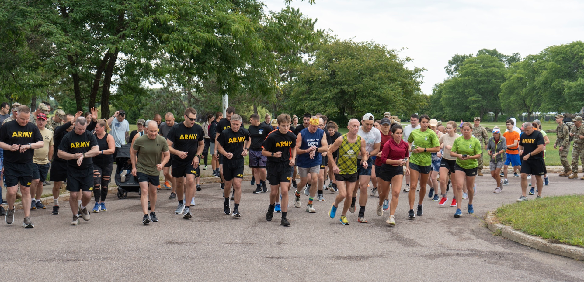 U.S. Army Soldiers assigned to the Vermont National Guard, run in the Vermont Remembers Run 2025 with community members at Camp Johnson.