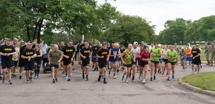 U.S. Army Soldiers assigned to the Vermont National Guard, run in the Vermont Remembers Run 2025 with community members at Camp Johnson.