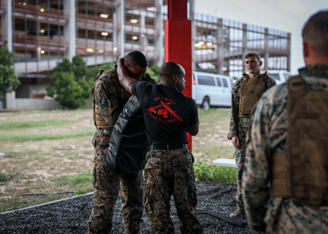 U.S. Marines with 4th Reconnaissance Battalion, 4th Marine Division participate in a martial arts instructor (MAI) course hosted by 4th Reconnaissance Battalion aboard Fort Sam Houston, San Antonio, Texas, June 26, 2025. The MAI course is a physically and mentally demanding course designed to strengthen the mental and moral resiliency of Marines through tough realistic training enabling Marines to train their respective units. (U.S. Marine Corps photo by Sgt. Jacqueline Peguero-Montes)