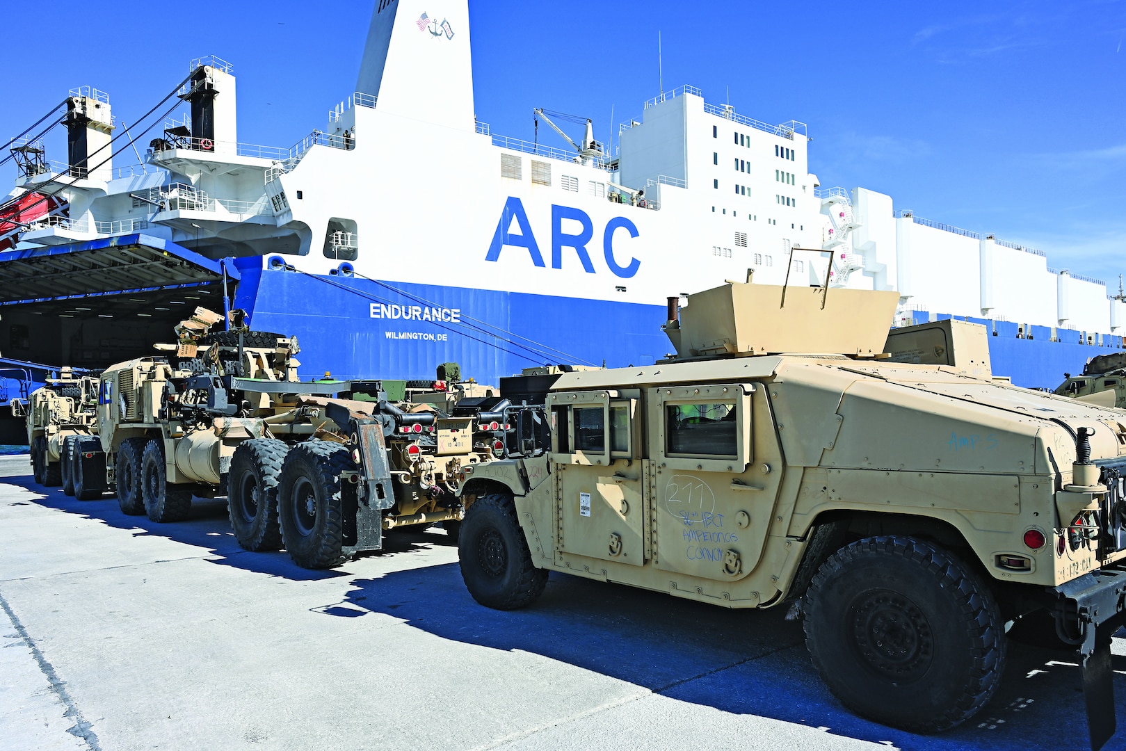 U.S. Army Vehicles offloaded from the cargo vessel ARC ENDURANCE at the port of Kavala, Greece, Apr. 29, 2025, in support of the DEFENDER 25. Dynamic Employment of Forces to Europe for NATO Deterrence and Enhanced Readiness, also known as DEFENDER, is the largest annual U.S. Army security cooperation and exercise in Europe. DEFENDER 25 includes nearly 12,000 U.S. and 13,000 Allied and partner service members from 29 other nations, including Greece. DEFENDER 25 marks the first-time deployment of U.S. Army forces through the Port of Kavala, Greece, to include reception, staging, and onward movement (RSOM) throughout Czechia. DEFENDER 25 is the deployment of U.S. forces into a series of exercises designed to demonstrate the ability of the U.S. Army to respond and sustain operations of continental-based divisions, enablers, and joint forces and rehearse the integration of U.S. troops with NATO allies and partners for large scale combat operations from the High North to Mediterranean and Black Sea regions. (U.S. Army photo by Davide Dalla Massara)