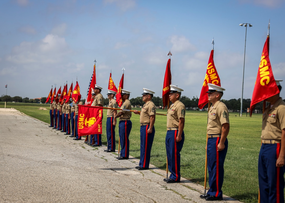 U.S. Marines with Recruiting Station San Antonio, 8th Marine Corps District, Western Recruiting Region, report in during Recruiting Station San Antonio’s change of command ceremony on Joint Base San Antonio-Fort Sam Houston, San Antonio, Texas, June 13, 2025. The Change of Command Ceremony is to represent the transfer of authority, responsibility, and accountability to the incoming Commanding Officer Maj. Dylan J. Riedell. (U.S. Marine Corps Photo by Sgt. Jacqueline Peguero-Montes)