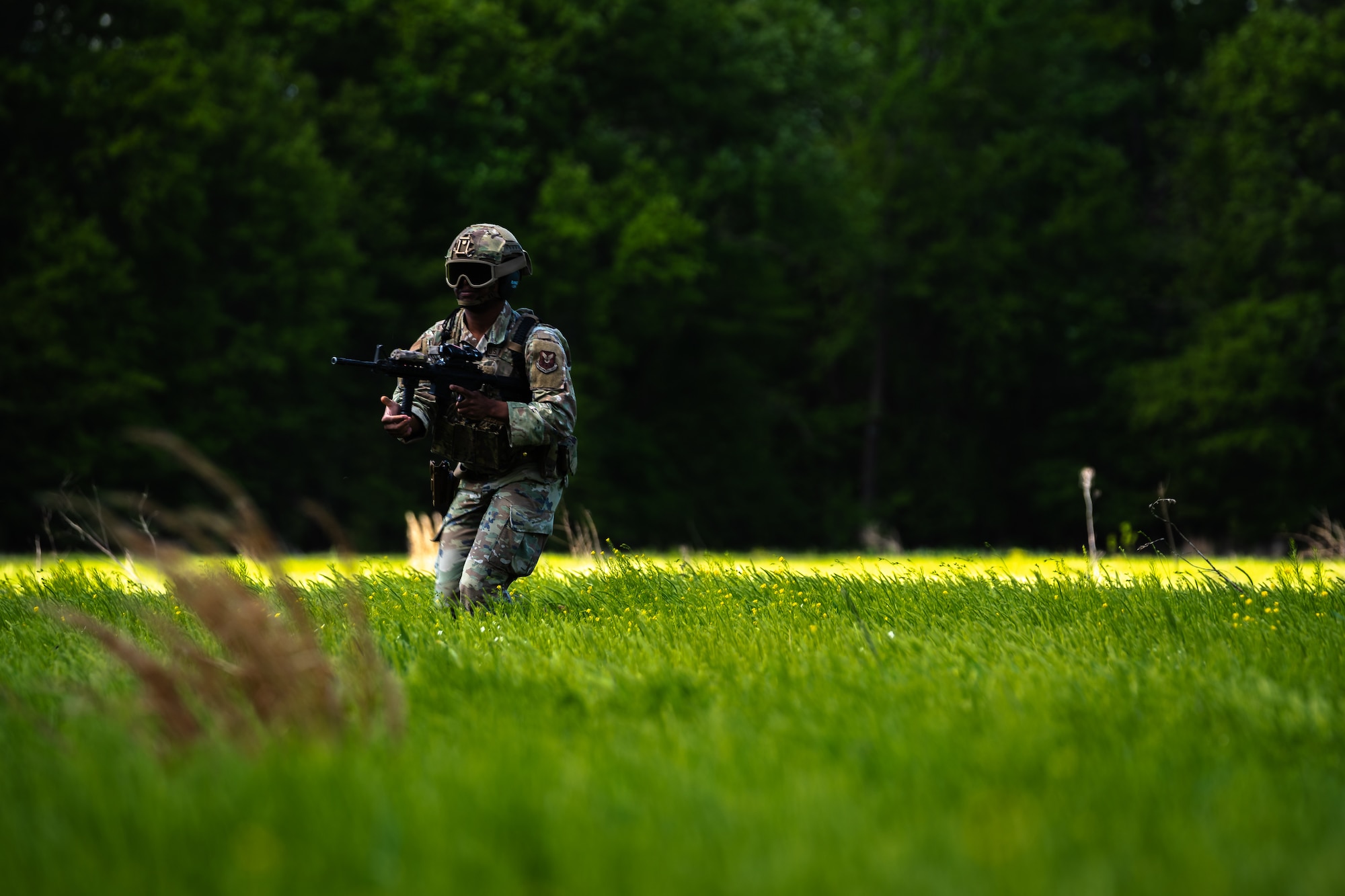 A Base Response Team member assigned to the 509th Security Forces Squadron seeks out a simulated high-value target during an exercise in Clinton, Missouri, May 4, 2025. The 509th SFS Base Response Team is trained to mitigate threats, defend personnel and protect strategic assets at Whiteman Air Force Base, Missouri. (U.S. Air Force photo by Staff Sgt. Joshua Hastings)