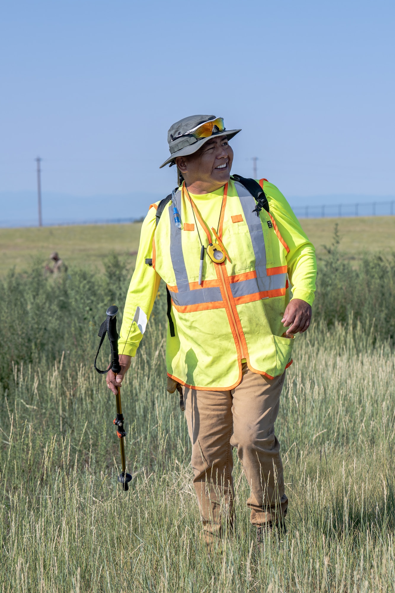 Lance Ware, a Tribal Cultural Specialist for the Traditional Cultural Places Survey, surveys the western perimeter of Schriever Space Force Base.
