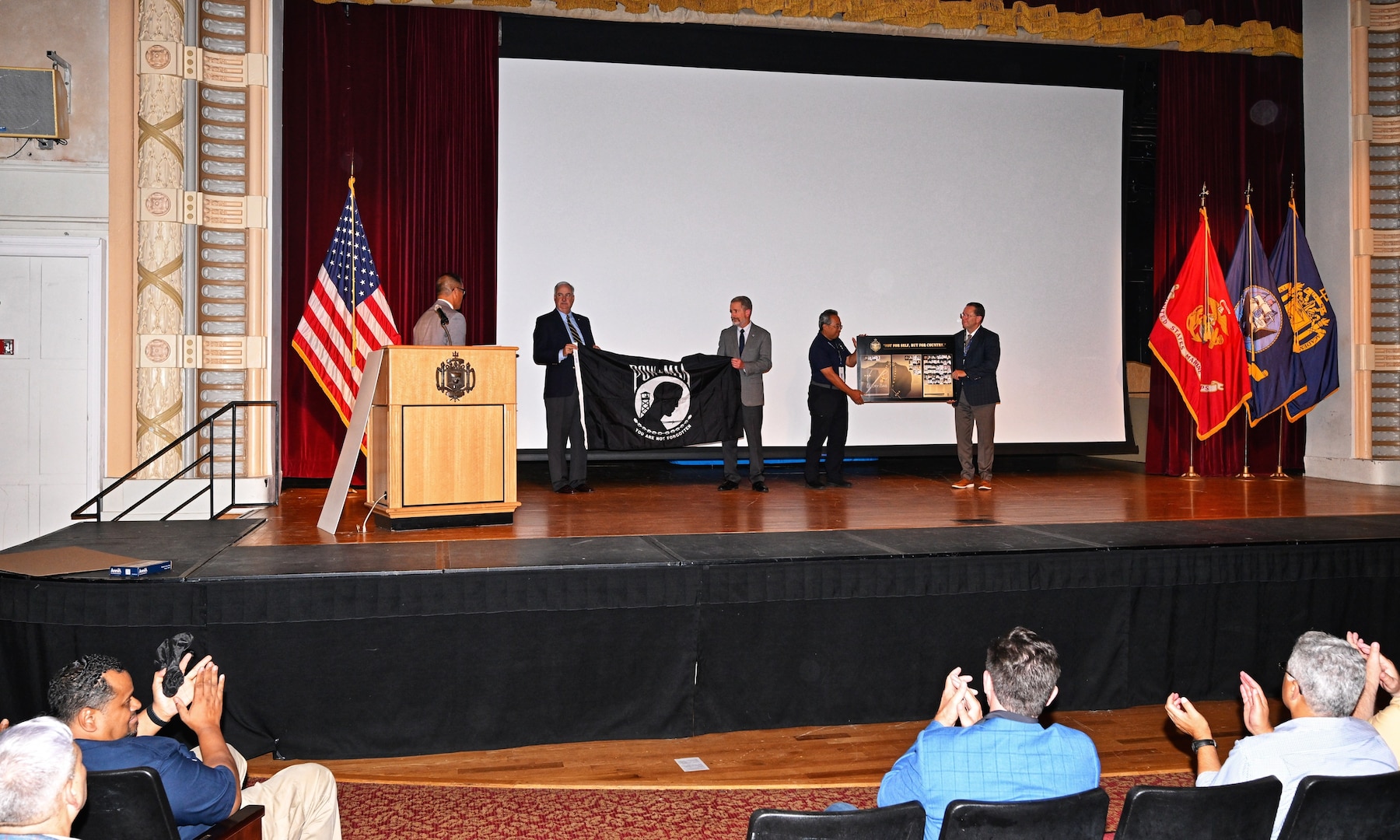 Jon Figuerres, a member of the academy’s class of 1985 and the Defense POW/MIA Accounting Agency senior operations officer, was given an award during the Naval Academy 40th class reunion, Sept. 19, 2025, in Annapolis, Md.