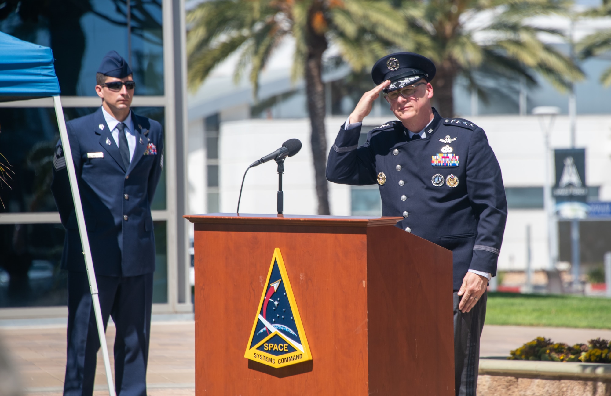 U.S. Space Force Gen. Michael A. Guetlein, direct reporting program manager, Golden Dome for America salutes the military space pioneers and their families who were honored during the Gen. Bernard Schriever Wall of Honor ceremony, Sept. 4, 2025, at Los Angeles Air Force Base (LA AFB) in El Segundo, California. Each year, Space Systems Command inscribes the names of six military space pioneers into the Schriever Wall of Honor during a ceremony held at Space Systems Command’s headquarters at LA AFB. This year’s honorees include Retired U.S. Air Force Lt. Gen. Samuel A. Greaves, Retired U.S. Air Force Col. Jack L. Hyslop, Dr. Donald N. Jortner, Retired U.S. Air Force Col., Mr. Douglas L. Loverro, Retired U.S. Air Force Col. Mr. David W. Madden, and Retired U.S. Air Force Maj. Gen. Thomas D. Taverney.