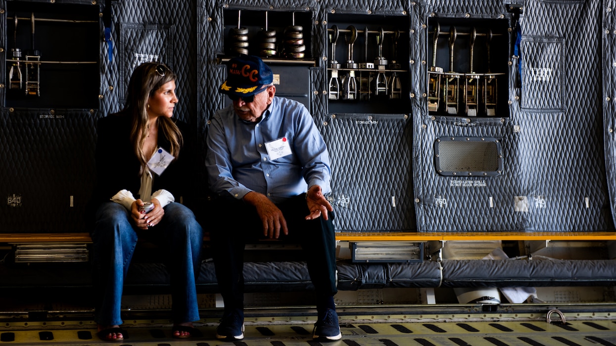 Honorary commander and golden bear speak aboard aircraft