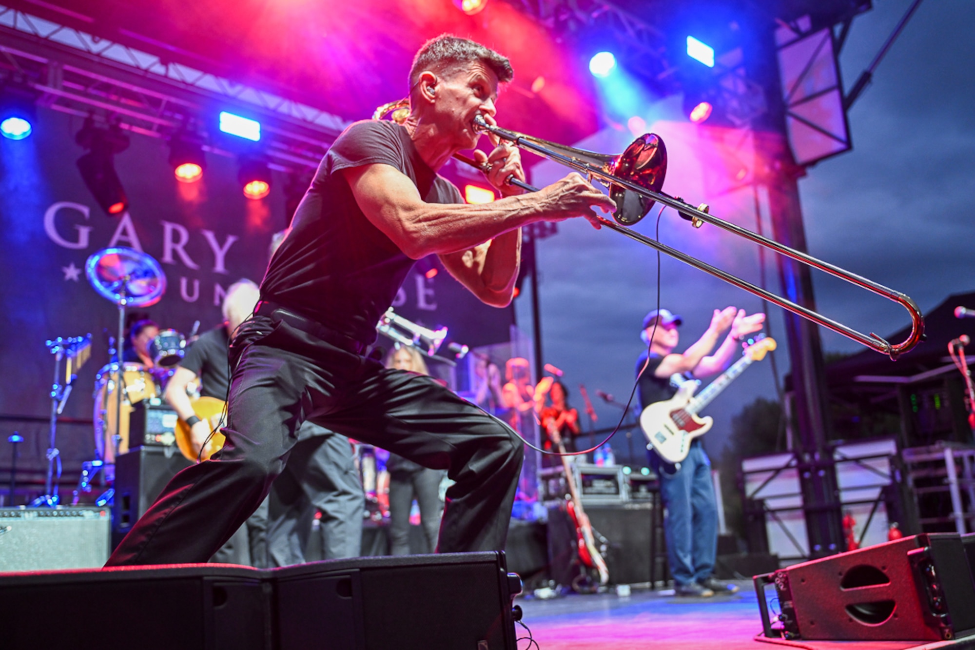 Trombonist Harry Watters performs with the Lt. Dan Band.