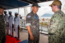 Commander, U.S. 7th Fleet Vice Adm. Fred Kacher greets Commander, Republic of Korea Fleet Vice Adm. Hwang Seon-woo on the quarterdeck aboard U.S. 7th Fleet flagship USS Blue Ridge (LCC 19) after arriving in Busan, Republic of Korea, Sept. 25, 2025.