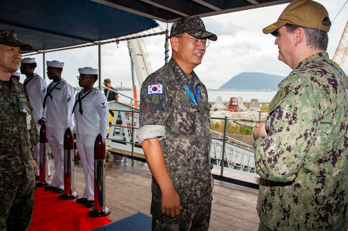 Commander, U.S. 7th Fleet Vice Adm. Fred Kacher greets Commander, Republic of Korea Fleet Vice Adm. Hwang Seon-woo on the quarterdeck aboard U.S. 7th Fleet flagship USS Blue Ridge (LCC 19) after arriving in Busan, Republic of Korea, Sept. 25, 2025.
