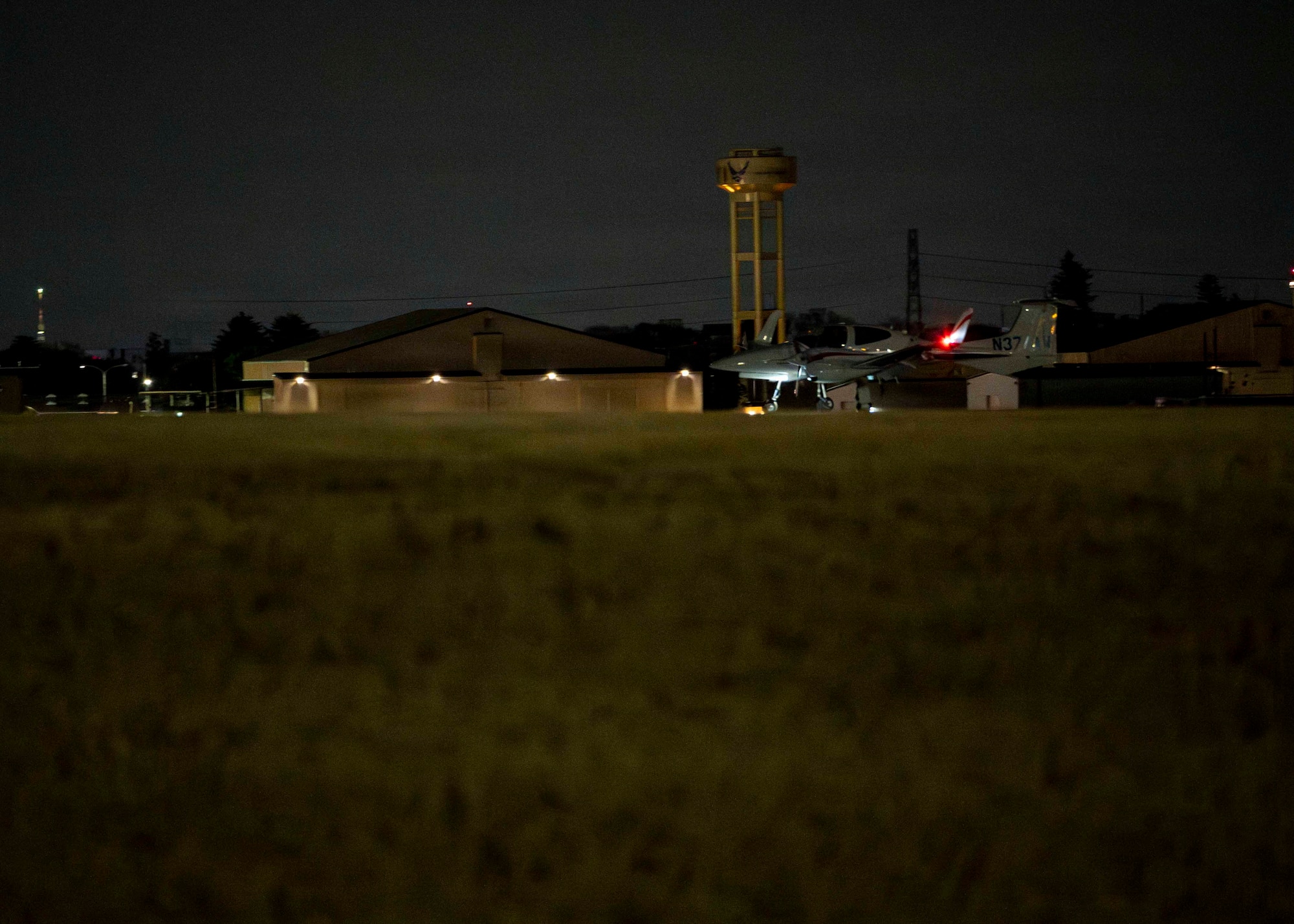 A Diamond DA42 NG Twin Star assigned to the Yokota Flight Center lands during a small parts delivery mission as part of exercise Beverly Midnight 2026 at Yokota Air Base, Japan, March 13, 2026. BM26 provides an optimal environment to enhance and understand possible opportunities to continue the advancement of shared interests.